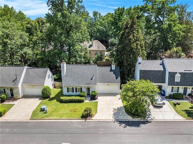 1175 Haven Brook Way, Atlanta, GA 30319 - view of front of property featuring concrete driveway, a chimney, and an attached garage