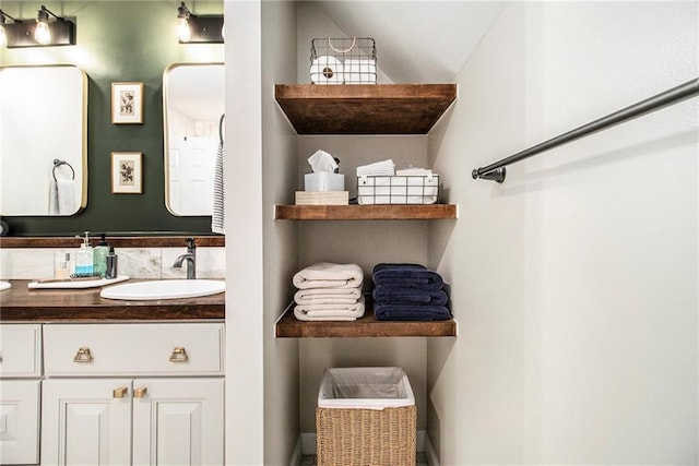 1175 Haven Brook Way, Atlanta, GA 30319 - bathroom with double vanity and vaulted ceiling