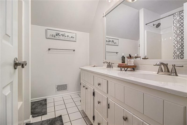 1175 Haven Brook Way, Atlanta, GA 30319 - full bathroom featuring double vanity, vaulted ceiling, a shower, and tile patterned floors