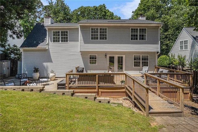 1175 Haven Brook Way, Atlanta, GA 30319 - back of property featuring a chimney, a lawn, a wooden deck, and a patio