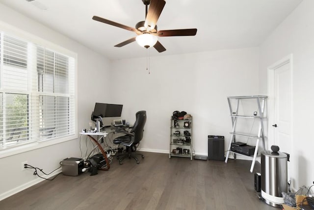 office space with dark hardwood / wood-style flooring and ceiling fan