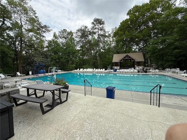 community pool featuring a patio
