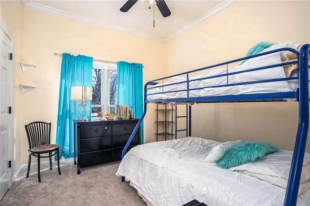 bedroom with ceiling fan, baseboards, carpet floors, and ornamental molding