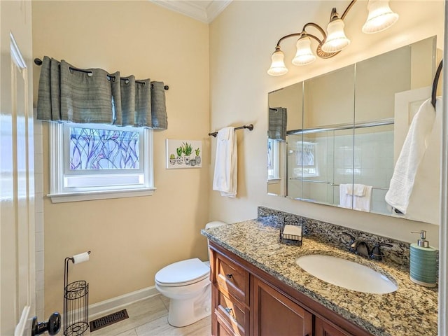 bathroom featuring visible vents, a shower stall, toilet, ornamental molding, and vanity