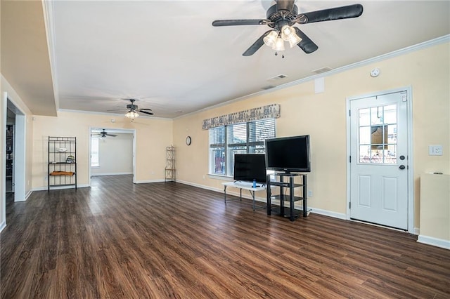 unfurnished living room featuring dark wood finished floors, crown molding, a ceiling fan, and visible vents