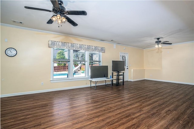 unfurnished room with wood finished floors, baseboards, visible vents, ceiling fan, and crown molding