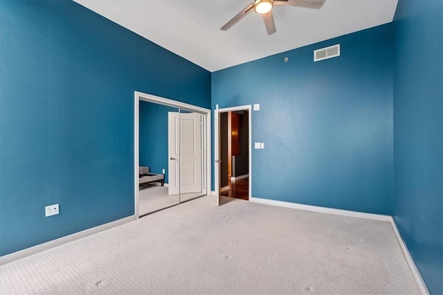 855 Peachtree St NE Unit 2713, Atlanta, GA 30308 - unfurnished bedroom with carpet floors, baseboards, visible vents, and a closet