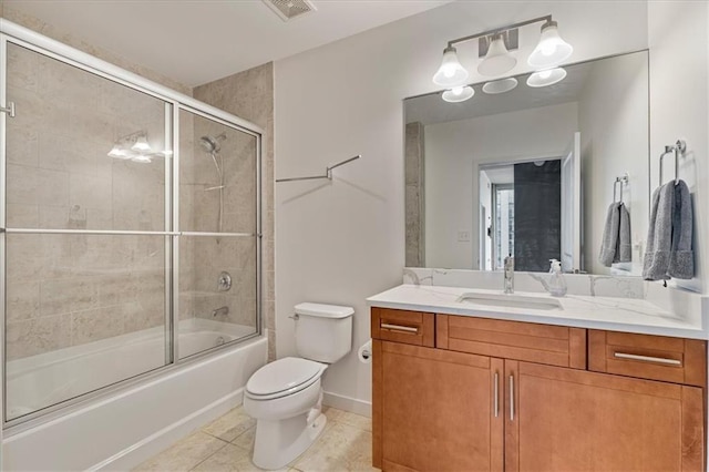 855 Peachtree St NE Unit 2713, Atlanta, GA 30308 - bathroom with visible vents, tile patterned flooring, vanity, toilet, and shower / bath combination with glass door