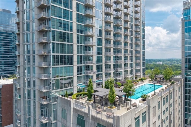 855 Peachtree St NE Unit 2713, Atlanta, GA 30308 - view of building exterior featuring a community pool