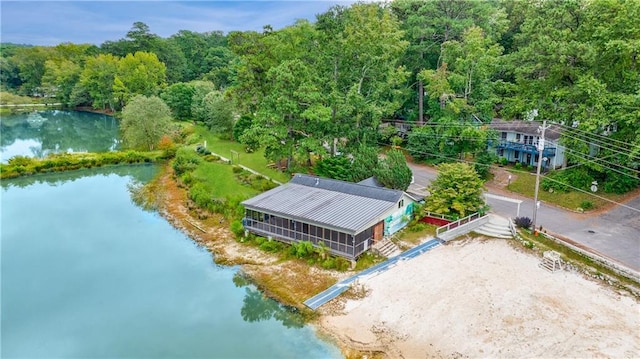 drone / aerial view with a water view