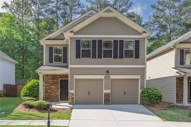 506 Tallapoosa Trl, Woodstock, GA 30188 - craftsman-style home featuring fence, a garage, stone siding, and driveway