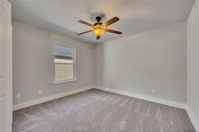 506 Tallapoosa Trl, Woodstock, GA 30188 - spare room with carpet, baseboards, and ceiling fan