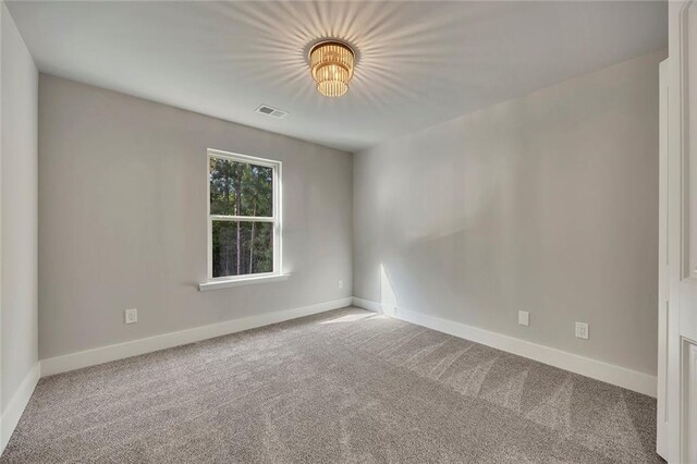 506 Tallapoosa Trl, Woodstock, GA 30188 - carpeted empty room featuring visible vents and baseboards