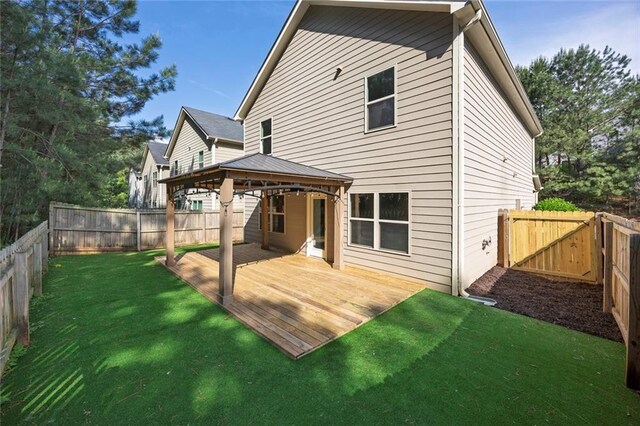 506 Tallapoosa Trl, Woodstock, GA 30188 - rear view of property with a lawn, a gazebo, a wooden deck, and a fenced backyard