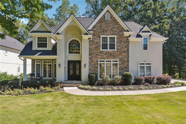 view of front facade featuring a front yard