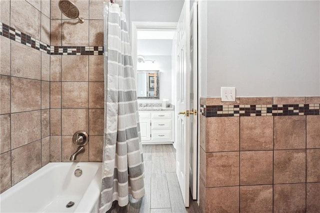 bathroom featuring shower / tub combo and wood-type flooring