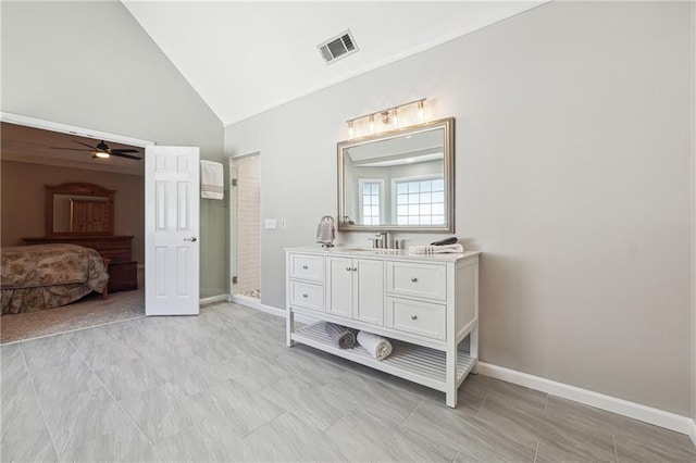 bathroom with high vaulted ceiling, vanity, ceiling fan, and an enclosed shower