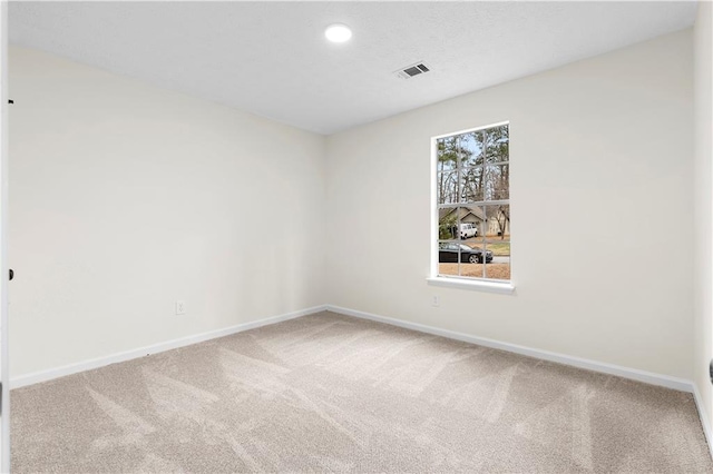 empty room with carpet flooring