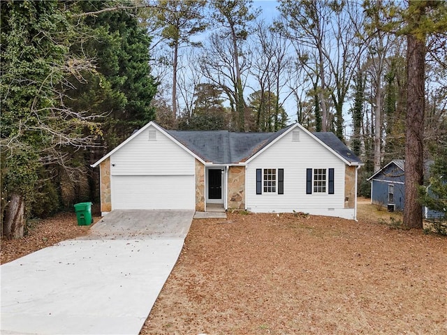 ranch-style home featuring a garage