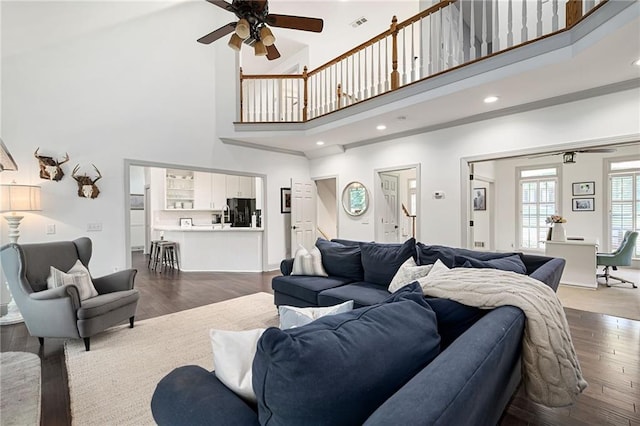 1642 Reflections Trl, Powder Springs, GA 30127 - living area featuring ceiling fan, a high ceiling, dark wood finished floors, and recessed lighting