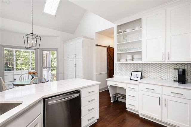 1642 Reflections Trl, Powder Springs, GA 30127 - kitchen with stainless steel dishwasher, a barn door, tasteful backsplash, a chandelier, and vaulted ceiling