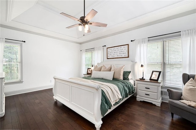 1642 Reflections Trl, Powder Springs, GA 30127 - bedroom featuring a raised ceiling, dark wood-style floors, multiple windows, and crown molding