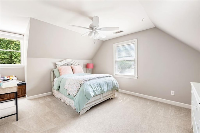 1642 Reflections Trl, Powder Springs, GA 30127 - bedroom with light colored carpet, vaulted ceiling, and a ceiling fan
