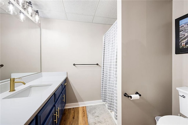 1642 Reflections Trl, Powder Springs, GA 30127 - full bathroom with vanity, wood finished floors, a drop ceiling, and a shower with curtain