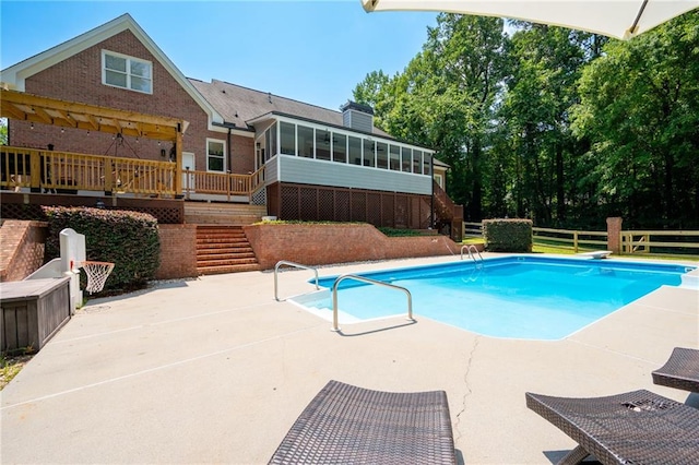 1642 Reflections Trl, Powder Springs, GA 30127 - outdoor pool with a sunroom, stairs, a patio, and a wooden deck
