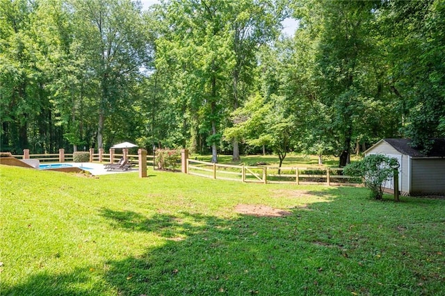 1642 Reflections Trl, Powder Springs, GA 30127 - view of yard featuring a storage unit
