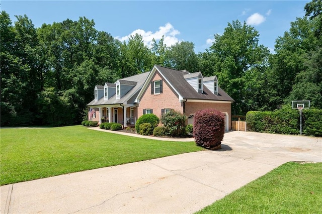 1642 Reflections Trl, Powder Springs, GA 30127 - cape cod house featuring driveway, a front lawn, a garage, a porch, and brick siding