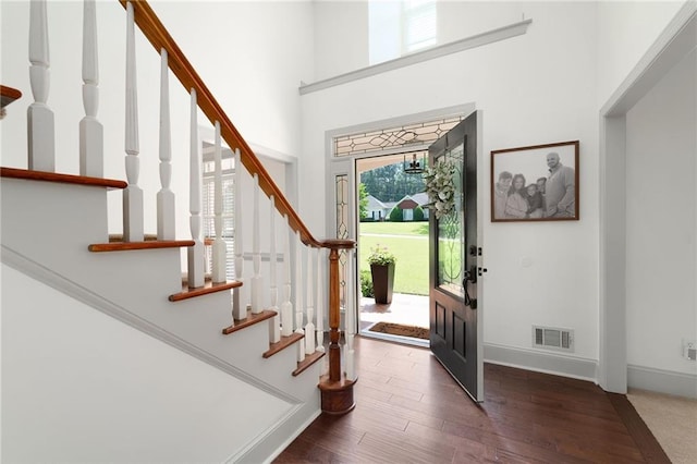 1642 Reflections Trl, Powder Springs, GA 30127 - foyer with stairway, wood finished floors, and a towering ceiling