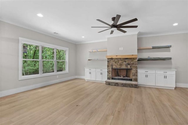 381 Chattahoochee Glen Rd, Clarkesville, GA 30523 - unfurnished living room featuring crown molding, ceiling fan, light wood-type flooring, a fireplace, and baseboards