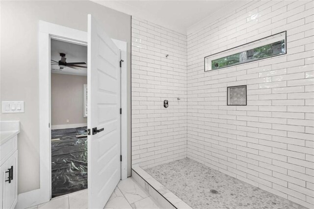 381 Chattahoochee Glen Rd, Clarkesville, GA 30523 - full bathroom featuring marble finish floors, vanity, ceiling fan, and tiled shower