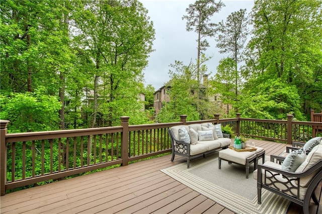 wooden terrace with outdoor lounge area