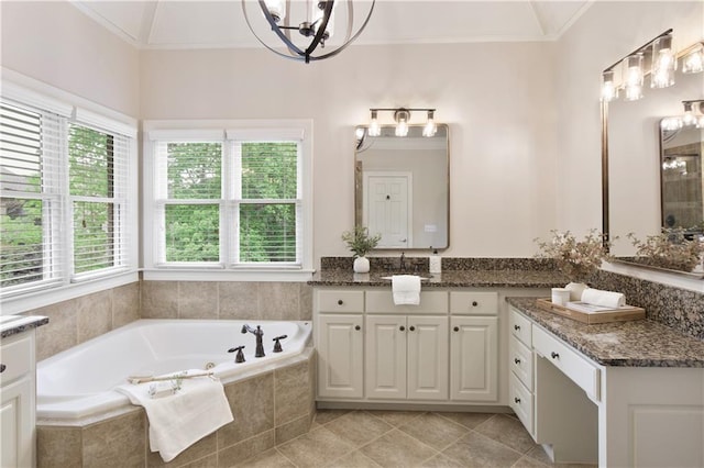 full bath with a notable chandelier, ornamental molding, and plenty of natural light