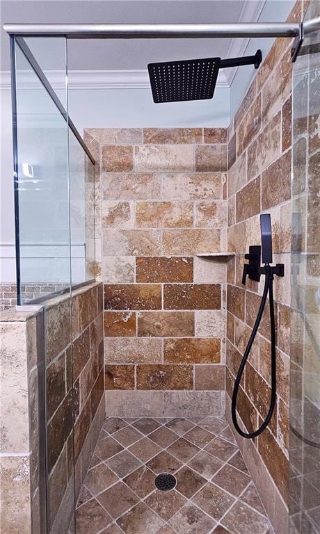 bathroom with a tile shower