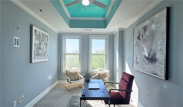 sitting room featuring baseboards, carpet flooring, crown molding, visible vents, and ceiling fan