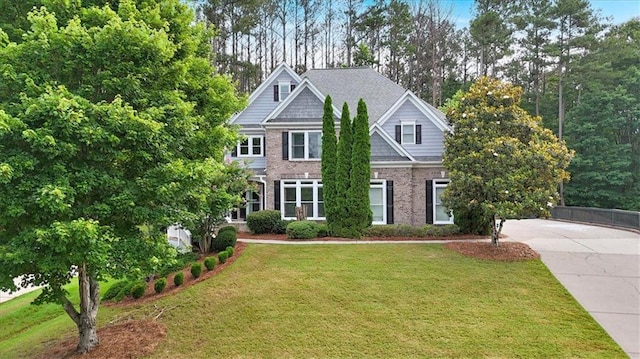 212 Thorncliff Way, Acworth, GA 30101 - view of front facade with driveway, a front lawn, and brick siding