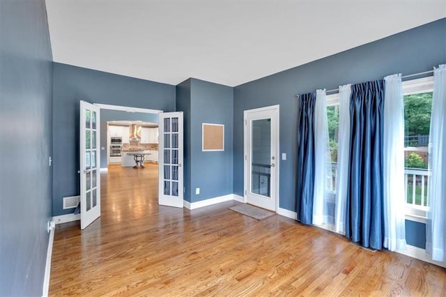 212 Thorncliff Way, Acworth, GA 30101 - foyer with french doors and wood finished floors