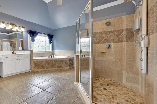 212 Thorncliff Way, Acworth, GA 30101 - bathroom with a garden tub, a stall shower, vanity, and vaulted ceiling