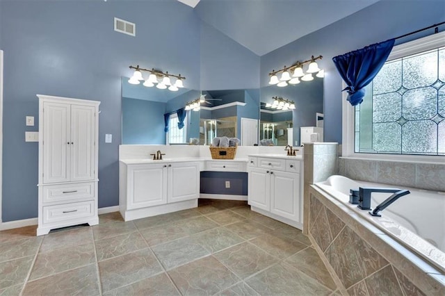 212 Thorncliff Way, Acworth, GA 30101 - full bathroom with high vaulted ceiling, vanity, a garden tub, ceiling fan, and a shower