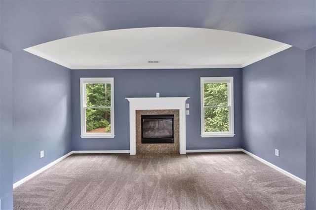 212 Thorncliff Way, Acworth, GA 30101 - unfurnished living room with ornamental molding, carpet flooring, plenty of natural light, and a high end fireplace