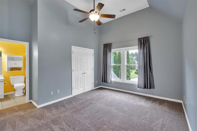 212 Thorncliff Way, Acworth, GA 30101 - unfurnished bedroom with high vaulted ceiling, carpet floors, a closet, ensuite bathroom, and ceiling fan