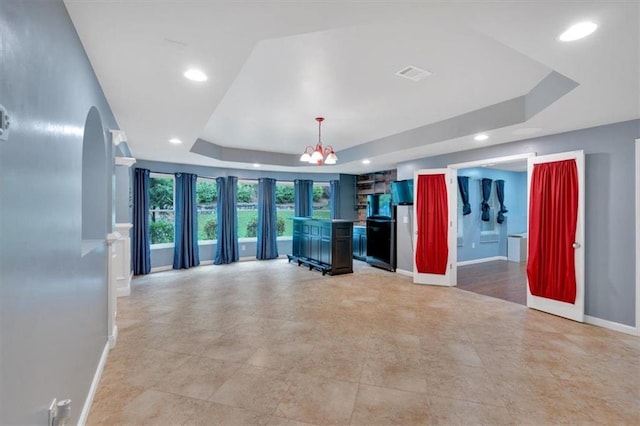 212 Thorncliff Way, Acworth, GA 30101 - miscellaneous room with a tray ceiling, recessed lighting, a chandelier, and light tile patterned floors