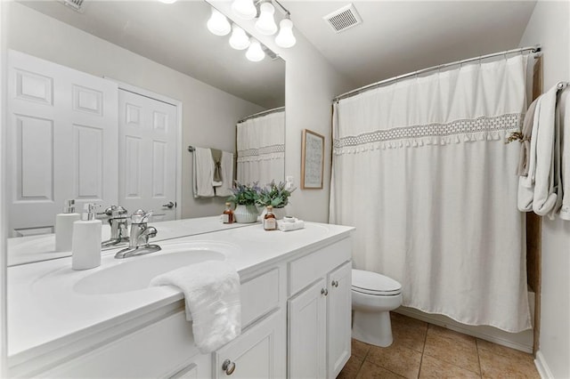 5828 Paliser Trce, Sugar Hill, GA 30518 - bathroom with vanity, toilet, and tile patterned flooring