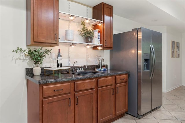 5828 Paliser Trce, Sugar Hill, GA 30518 - kitchen with a sink, stainless steel fridge with ice dispenser, brown cabinets, and light tile patterned flooring