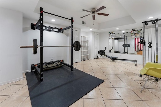 5828 Paliser Trce, Sugar Hill, GA 30518 - workout room featuring tile patterned flooring, ceiling fan, recessed lighting, baseboards, and a tray ceiling