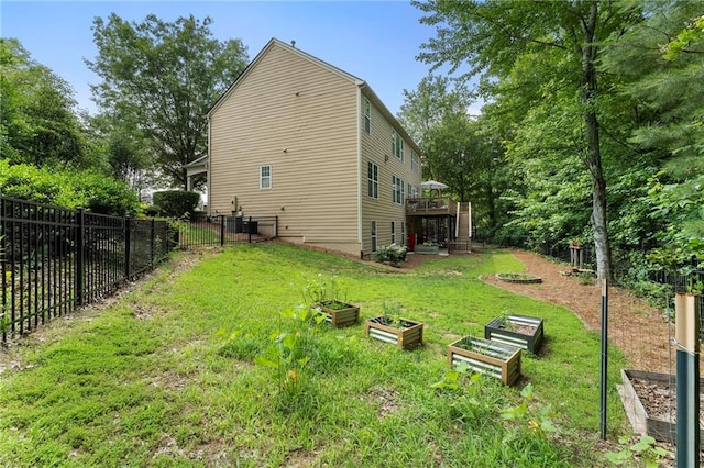 5828 Paliser Trce, Sugar Hill, GA 30518 - back of house with a garden, a deck, and stairs