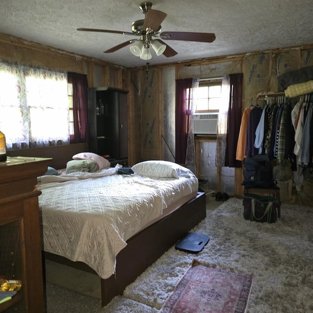 80 Two Run Creek Trl NW, Cartersville, GA 30120 - bedroom with cooling unit, a textured ceiling, carpet, and ceiling fan